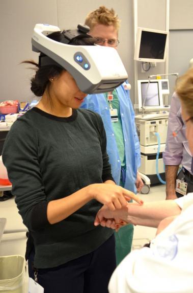 Woman uses new technology in SAIL labs.